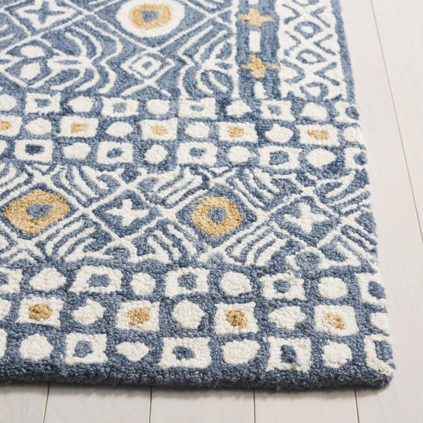 Safavieh Micro-loop Hand-tufted Wool And Cotton Area Rug - Elegant Geometric Design For Modern Homes Blue ,Ivory 80% Wool And 20% Cotton Mlp801m-5r