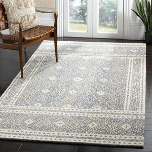 Safavieh Micro-loop Hand-tufted Rug In Elegant Grey And Ivory – Timeless Artistry For Any Home Decor Style Blue ,Ivory 80% Wool And 20% Cotton Mlp803m-10