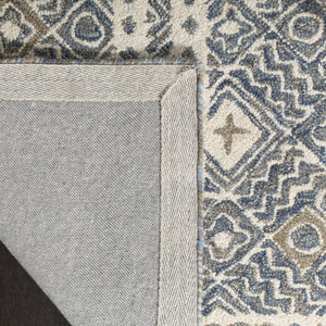 Safavieh Micro-loop Hand-tufted Rug In Elegant Grey And Ivory – Timeless Artistry For Any Home Decor Style Blue ,Ivory 80% Wool And 20% Cotton Mlp803m-10