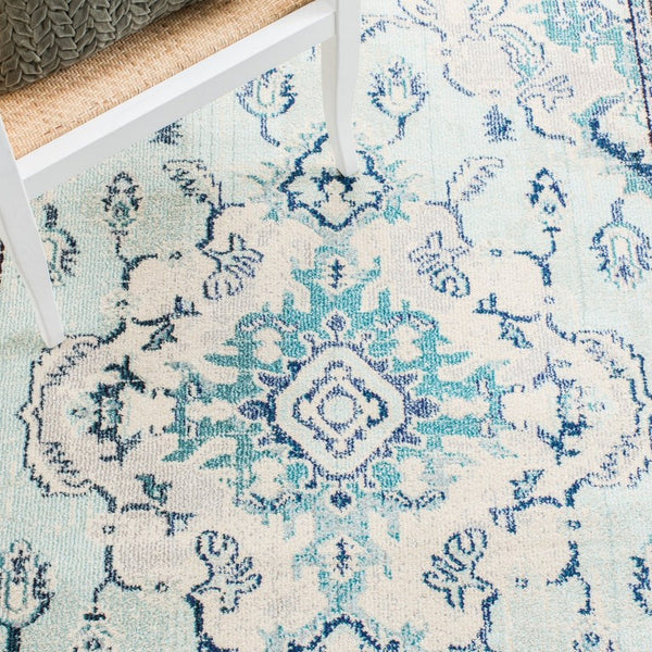 Safavieh Monaco Medallion Round Rug Power Loomed Polypropylene for Entryway or Reading Nook Light Blue / Ivory 2'-2" x 4'-0" MNC243K-24