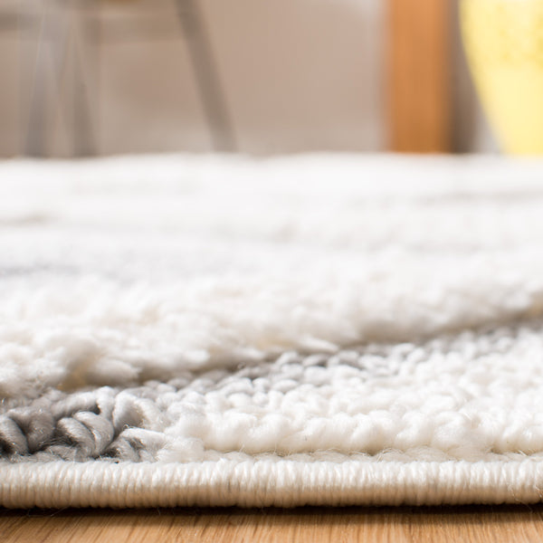 Safavieh Moroccan Tassel Shag Area Rug: Luxurious Geometric Design With Plush Comfort For Any Space Ivory ,Grey Polypropylene Pile Mts601f-4