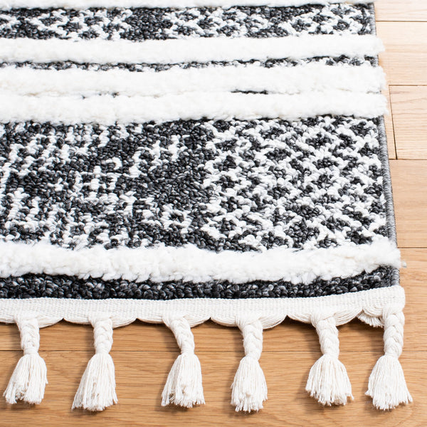 Safavieh Moroccan Tassel Shag Area Rug - Luxurious Black And Ivory Design For Stylish Home Décor Upgrade Black ,Ivory Polypropylene Pile Mts632z-7sq