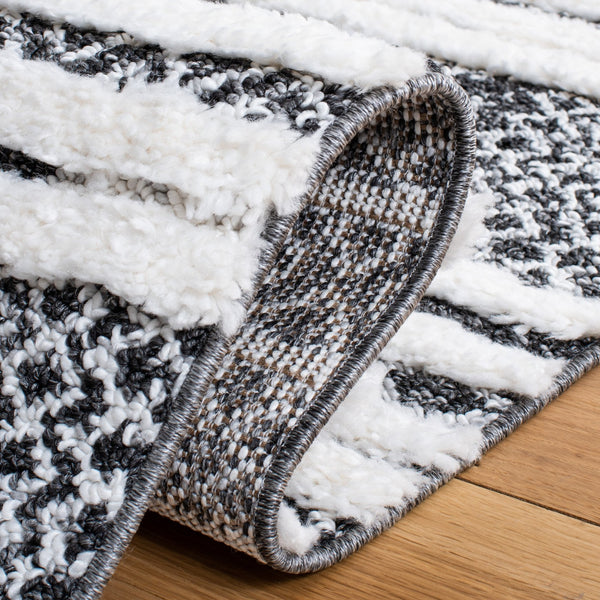 Safavieh Moroccan Tassel Shag Area Rug - Luxurious Black And Ivory Design For Stylish Home Décor Upgrade Black ,Ivory Polypropylene Pile Mts632z-7sq