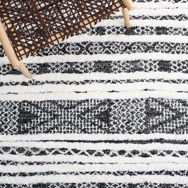 Safavieh Moroccan Tassel Shag Area Rug - Luxurious Black And Ivory Design For Stylish Home Décor Upgrade Black ,Ivory Polypropylene Pile Mts632z-7sq