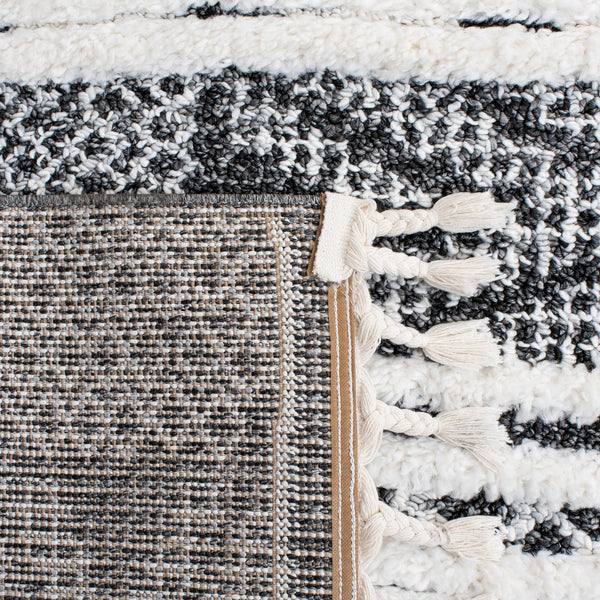 Safavieh Moroccan Tassel Shag Area Rug - Luxurious Black And Ivory Design For Stylish Home Décor Upgrade Black ,Ivory Polypropylene Pile Mts632z-7sq