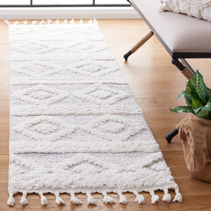 Safavieh Moroccan Tassel Shag Rug - Luxurious Power-loomed Creation For Timeless Elegance In Any Space Ivory ,Beige Polypropylene Pile Mts640a-4