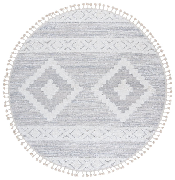 Safavieh Moroccan Tassel Shag Rug - Luxurious Power-loomed Creation For Timeless Elegance In Any Space Ivory ,Beige Polypropylene Pile Mts640a-4