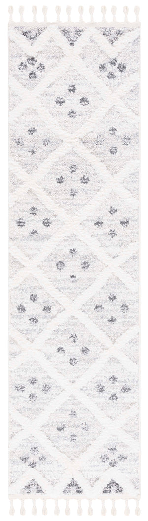 Safavieh Moroccan Tassel Shag Area Rug - Luxuriously Soft And Durable Design For Cozy Living Spaces Beige ,Ivory Polypropylene Pile Mts644a-8