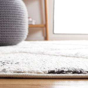 Safavieh Moroccan Tassel Shag Area Rug - Luxuriously Soft And Durable Design For Cozy Living Spaces Beige ,Ivory Polypropylene Pile Mts644a-8