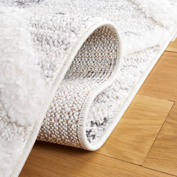 Safavieh Moroccan Tassel Shag Area Rug - Luxuriously Soft And Durable Design For Cozy Living Spaces Beige ,Ivory Polypropylene Pile Mts644a-8