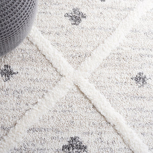 Safavieh Moroccan Tassel Shag Area Rug - Luxuriously Soft And Durable Design For Cozy Living Spaces Beige ,Ivory Polypropylene Pile Mts644a-8