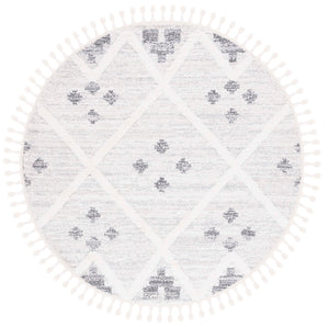 Safavieh Moroccan Tassel Shag Area Rug - Luxuriously Soft And Durable Design For Cozy Living Spaces Beige ,Ivory Polypropylene Pile Mts644a-8