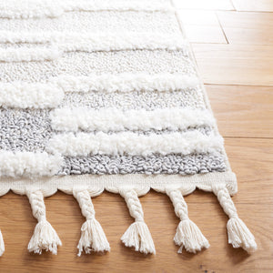 Safavieh Moroccan Tassel Shag Area Rug - Elegant Power Loomed Design For Modern And Traditional Spaces Beige ,Ivory Polypropylene Pile Mts646a-8