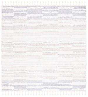 Safavieh Moroccan Tassel Shag Area Rug - Elegant Power Loomed Design For Modern And Traditional Spaces Beige ,Ivory Polypropylene Pile Mts646a-8