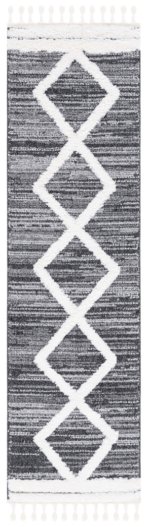 Safavieh Moroccan Tassel Shag Area Rug – Luxurious Power Loomed Design With Timeless Geometric Patterns Black ,Ivory Polypropylene Pile Mts650z-7r