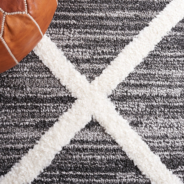 Safavieh Moroccan Tassel Shag Area Rug – Luxurious Power Loomed Design With Timeless Geometric Patterns Black ,Ivory Polypropylene Pile Mts650z-7r