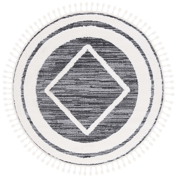 Safavieh Moroccan Tassel Shag Area Rug – Luxurious Power Loomed Design With Timeless Geometric Patterns Black ,Ivory Polypropylene Pile Mts650z-7r