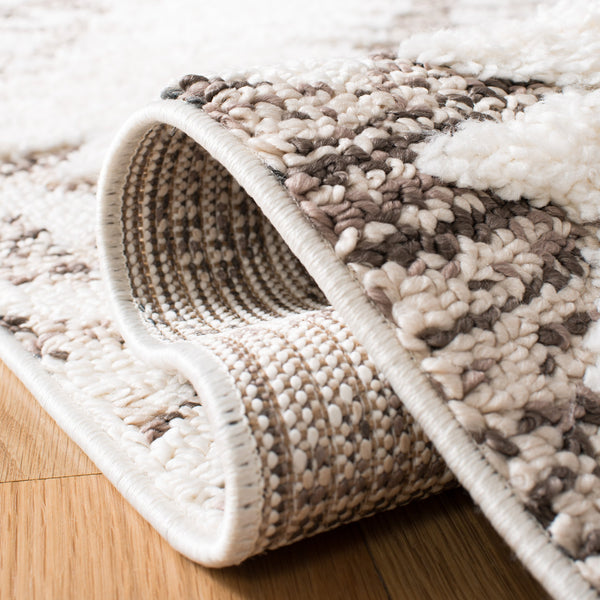 Safavieh Moroccan Tassel Shag Rug - Luxurious Ivory And Brown Design For Elegant Home Décor And Comfort Ivory ,Brown Polypropylene Pile Mts652a-220