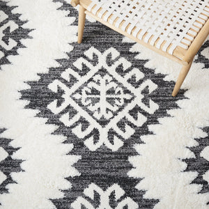 Safavieh Moroccan Tassel Shag Rug - Luxurious Ivory And Brown Design For Elegant Home Décor And Comfort Dark Grey ,Ivory Polypropylene Pile Mts652h-10