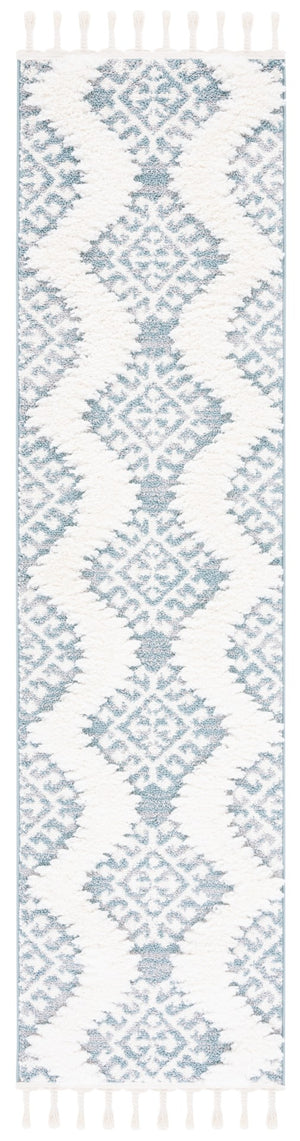 Safavieh Moroccan Tassel Shag Area Rug In Teal And Ivory – Global Inspired Decor For Elegant Spaces Teal ,Ivory Polypropylene Pile Mts652k-26