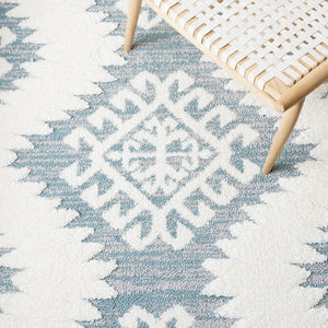 Safavieh Moroccan Tassel Shag Rug - Luxurious Ivory And Brown Design For Elegant Home Décor And Comfort Teal ,Ivory Polypropylene Pile Mts652k-8