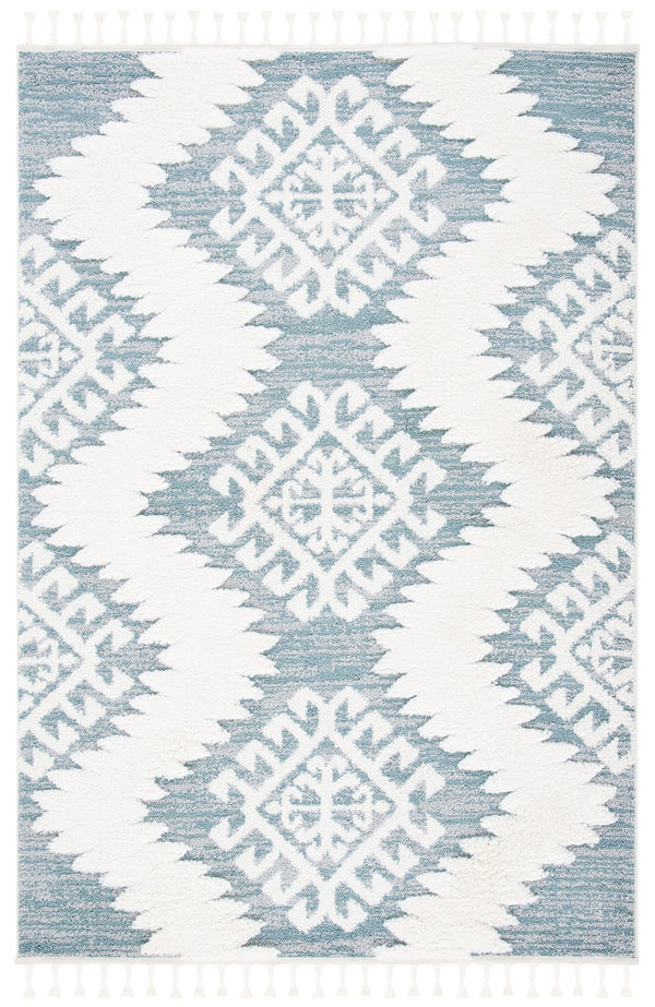 Safavieh Moroccan Tassel Shag Area Rug In Teal And Ivory – Global Inspired Decor For Elegant Spaces Teal ,Ivory Polypropylene Pile Mts652k-26