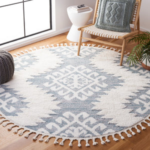Safavieh Moroccan Tassel Shag Area Rug In Teal And Ivory – Global Inspired Decor For Elegant Spaces Teal ,Ivory Polypropylene Pile Mts652k-26