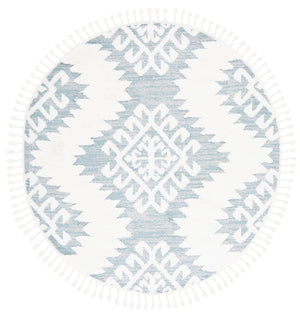 Safavieh Moroccan Tassel Shag Rug - Luxurious Ivory And Brown Design For Elegant Home Décor And Comfort Teal ,Ivory Polypropylene Pile Mts652k-8