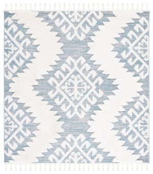 Safavieh Moroccan Tassel Shag Area Rug In Teal And Ivory – Global Inspired Decor For Elegant Spaces Teal ,Ivory Polypropylene Pile Mts652k-26