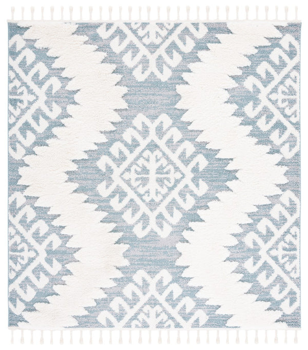 Safavieh Moroccan Tassel Shag Area Rug In Teal And Ivory – Global Inspired Decor For Elegant Spaces Teal ,Ivory Polypropylene Pile Mts652k-26