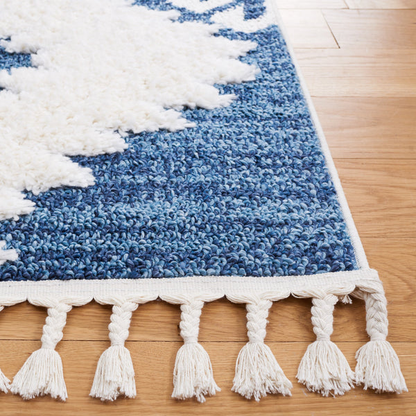 Safavieh Moroccan Tassel Shag Rug - Luxurious Ivory And Brown Design For Elegant Home Décor And Comfort Blue ,Ivory Polypropylene Pile Mts652m-8