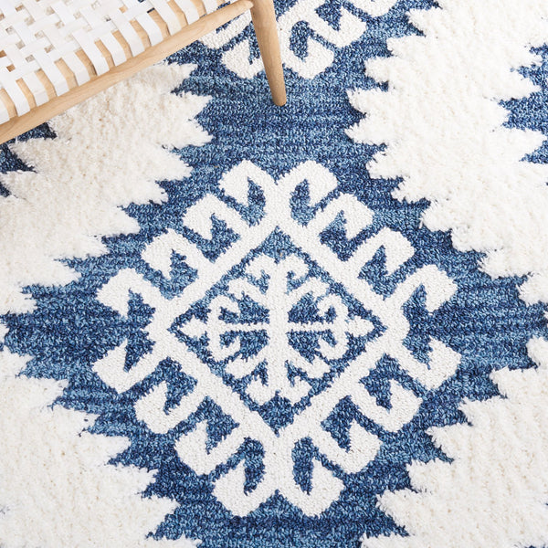 Safavieh Moroccan Tassel Shag Rug - Luxurious Ivory And Brown Design For Elegant Home Décor And Comfort Blue ,Ivory Polypropylene Pile Mts652m-8