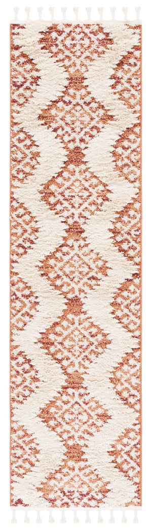Safavieh Moroccan Tassel Shag Area Rug In Teal And Ivory – Global Inspired Decor For Elegant Spaces Orange ,Ivory Polypropylene Pile Mts652p-210