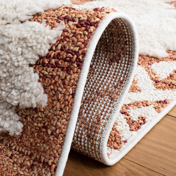 Safavieh Moroccan Tassel Shag Area Rug In Teal And Ivory – Global Inspired Decor For Elegant Spaces Orange ,Ivory Polypropylene Pile Mts652p-210