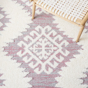Safavieh Moroccan Tassel Shag Rug - Luxurious Ivory And Brown Design For Elegant Home Décor And Comfort Pink ,Ivory Polypropylene Pile Mts652u-7r