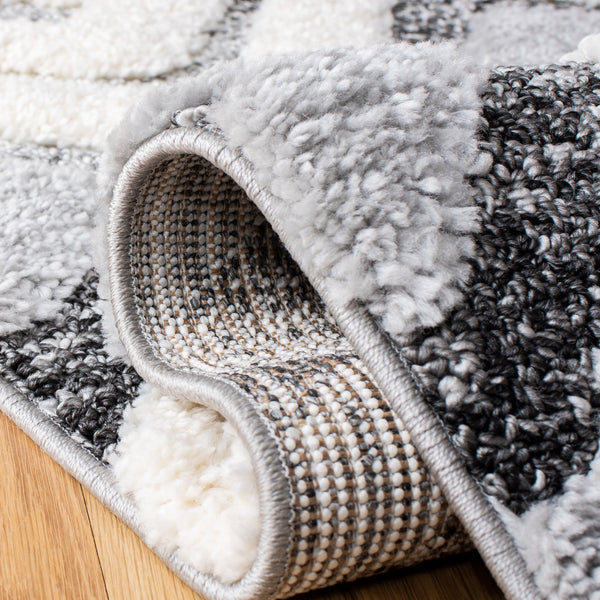 Safavieh Moroccan Tassel Shag Area Rug With Geometric Pattern - Luxurious Grey And Ivory Design For Any Space Grey ,Ivory Polypropylene Pile Mts661f-8