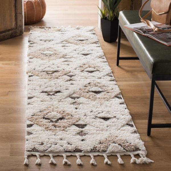 Safavieh Moroccan Tassel Shag Rug - Elegant Bohemian Design For Cozy Home Decor - Turkish Quality Craftsmanship Ivory ,Brown 65% Polypropylene,35% Jute + Poly,Cotton Mts688a-68ov