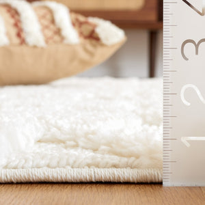 Safavieh Moroccan Tassel Shag 688 Power Loomed Shag & Flokati Rug Ivory 9' x 12'