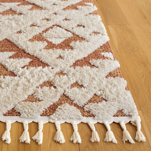 Safavieh Moroccan Tassel Shag 688 Power Loomed Shag & Flokati Rug Ivory / Brick Rust 5'-3" x 7'-6"
