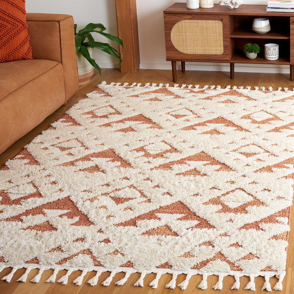 Safavieh Moroccan Tassel Shag 688 Power Loomed Polypropylene Pile Shag & Flokati Rug Ivory / Brick Rust MTS688P-7SQ