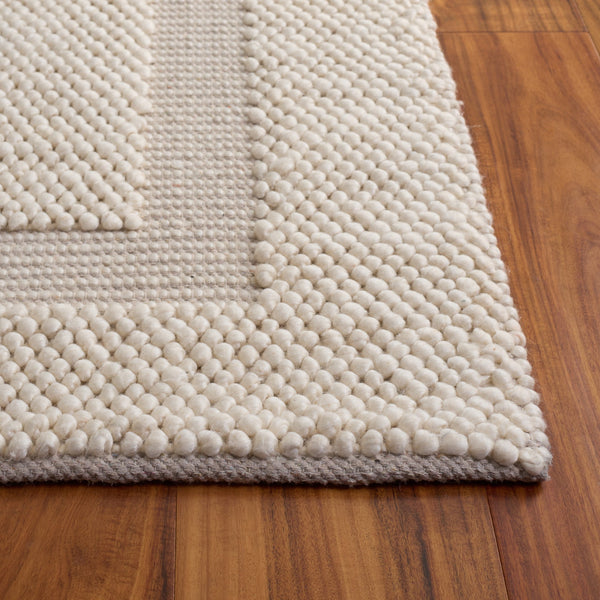Safavieh Natura Hand-Woven Ivory Area Rug—Low-Profile Wool Blend With Scandinavian Border, Durable Elegance 4'-0" x 6'-0" NAT133A-4