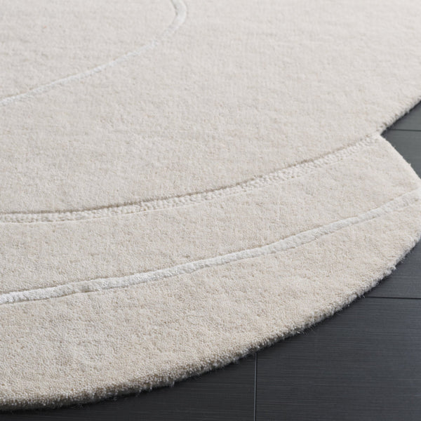 Safavieh Novelty 157a Ivory Area Rug - Hand Tufted 5x8 Ft, Modern Style, Soft Wool Blend For Elegant Spaces Ivory 95% Wool 5% Viscose Nov157a-58s