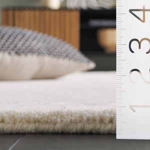 Safavieh Novelty 157a Ivory Area Rug - Hand Tufted 5x8 Ft, Modern Style, Soft Wool Blend For Elegant Spaces Ivory 95% Wool 5% Viscose Nov157a-58s