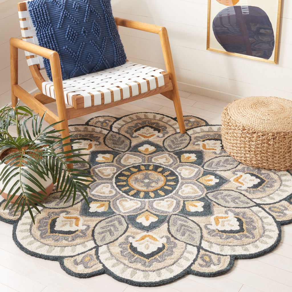 Safavieh Novelty 6' Round Hand Tufted Wool Rug in Gold and Ivory