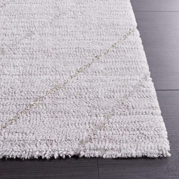 Safavieh Neptune 850 Power Loomed Solid & Tonal Rug Light Grey / Grey 5'-3" x 7'-6"