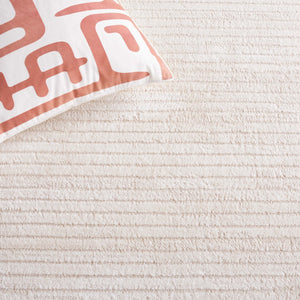 Safavieh Neptune 856 Power Loomed Solid & Tonal Rug Ivory / Beige 9' x 12'