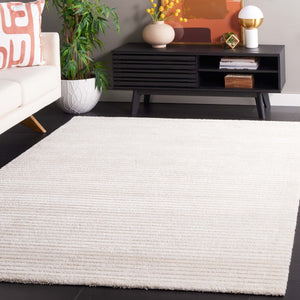 Safavieh Neptune 856 Power Loomed Solid & Tonal Rug Ivory / Beige 9' x 12'