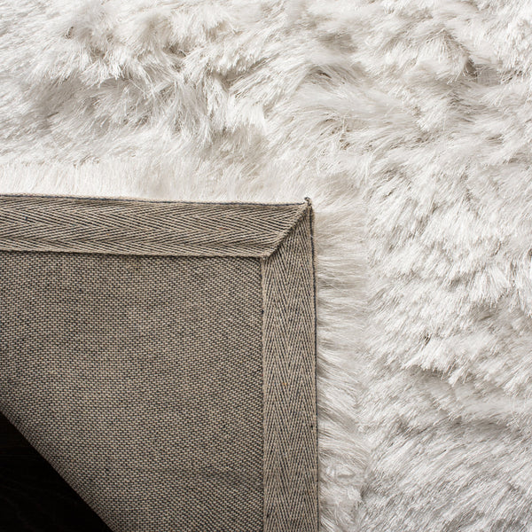 Safavieh Ocean Hand-tufted Shag Rug - Luxurious Ivory Comfort With 2.5-inch Pile Height For Elegant Spaces Ivory Polyester And Cotton Ocg101a-2