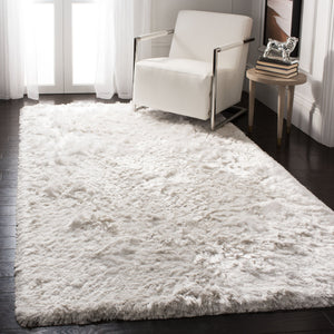 Safavieh Ocean Hand-tufted Shag Rug - Luxurious Ivory Comfort With 2.5-inch Pile Height For Elegant Spaces Ivory Polyester And Cotton Ocg101a-2
