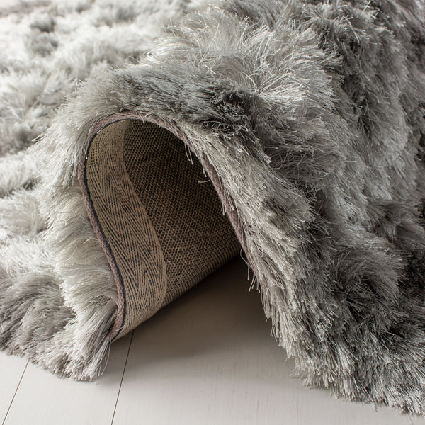 Safavieh Ocean Hand-tufted Shag Rug - Luxurious Ivory Comfort With 2.5-inch Pile Height For Elegant Spaces Silver Polyester And Cotton Ocg101g-2